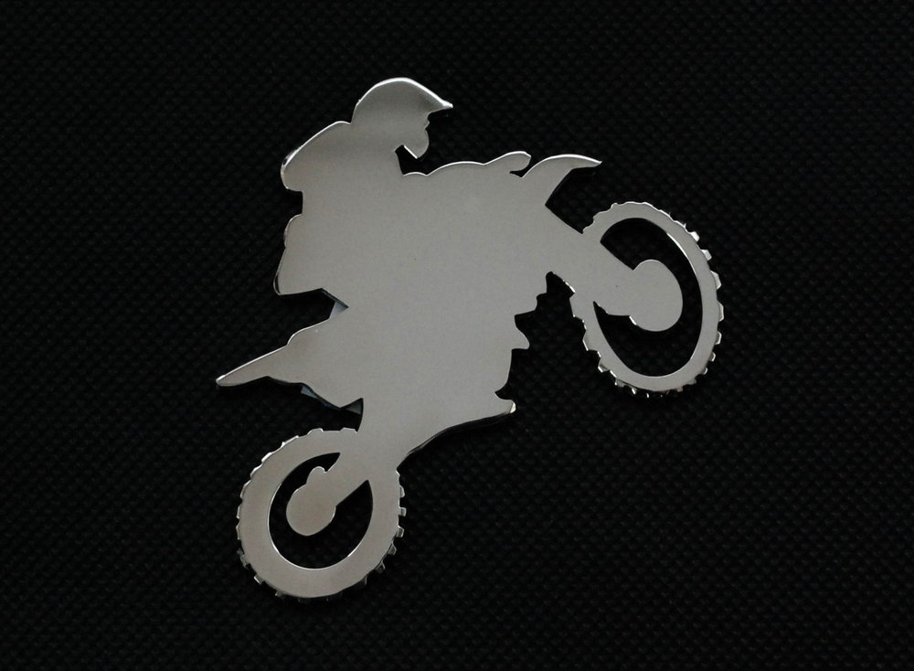 Emblemat w kształcie motocykla cross